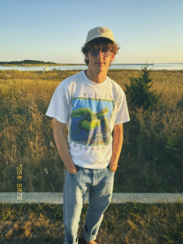 Community member wearing Human-i-Tees